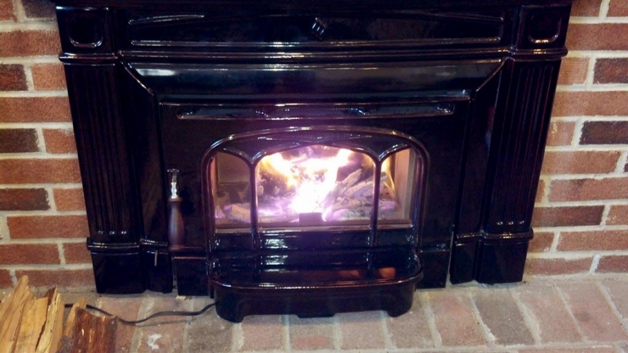 Wood-burning stove with fire burning inside
